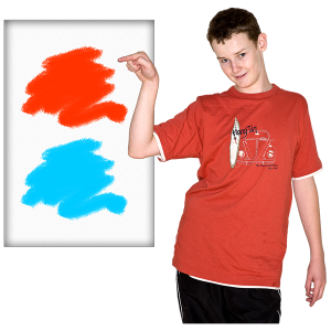 Image of a young man pointing at the colour red on a board which has two colours on it - red and blue