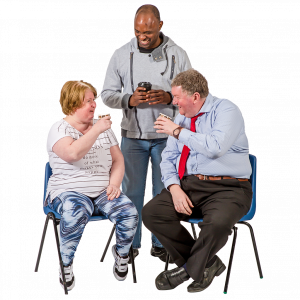 three people talking and drinking tea