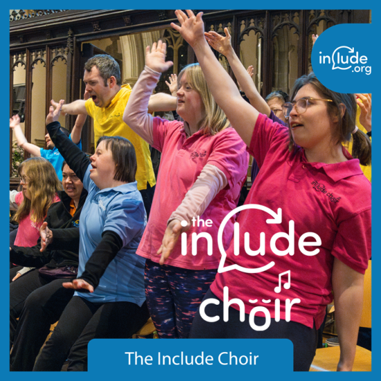 The Include Choir performing with arms raised