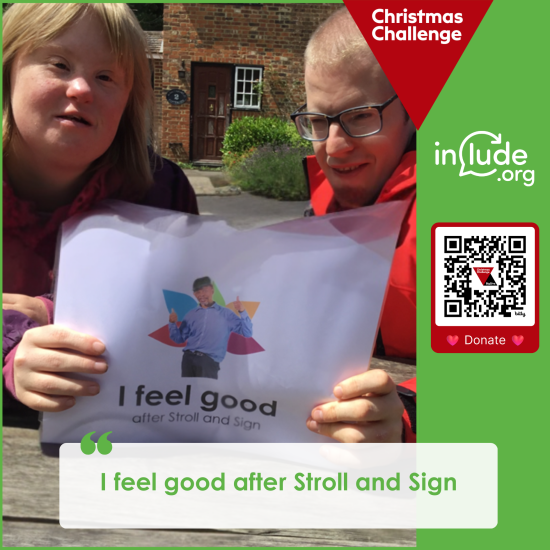 Stroll and Signers hold up a sign that reads: 