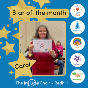 A celebratory 'Star of the Month' graphic, featuring a bright blue background decorated with gold stars and a sidebar of icons representing the values: Kind, Empowering, Fun, Inclusive, and Respectful. In the center is an image of Carol smiling and holding her 'Star of the Month' certificate. A large gold star highlights Carol’s name.