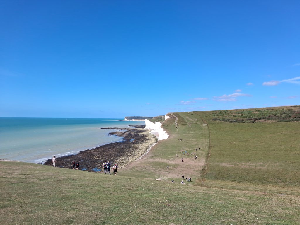 Stunning view across the south downs, perfect blue sky, rolling hills and coastline
