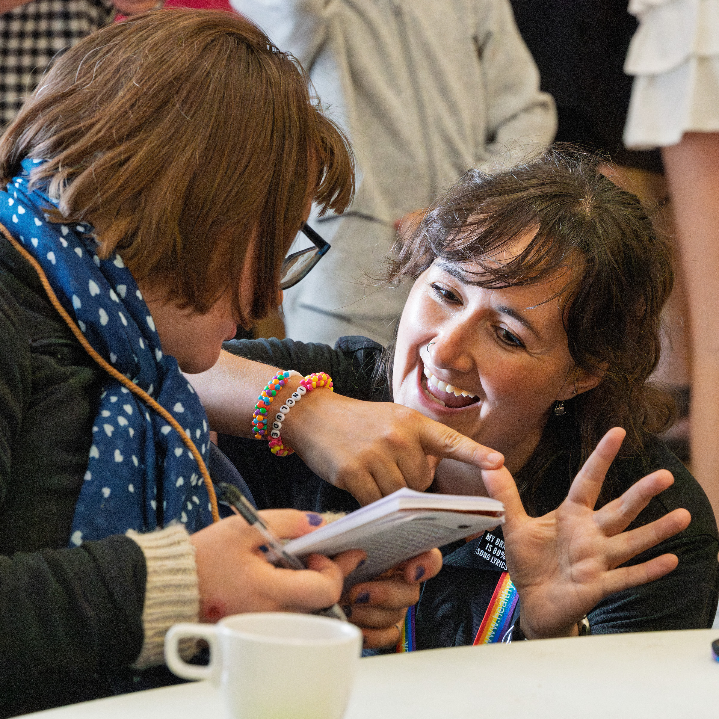 Makaton tutor teaching an individual in a friendly, relaxed environment